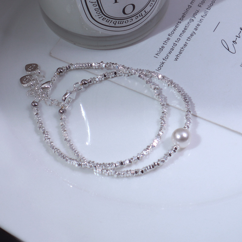 A Subtly Luxurious Niche-designed Bracelet Featuring A Few Pieces Of Silver