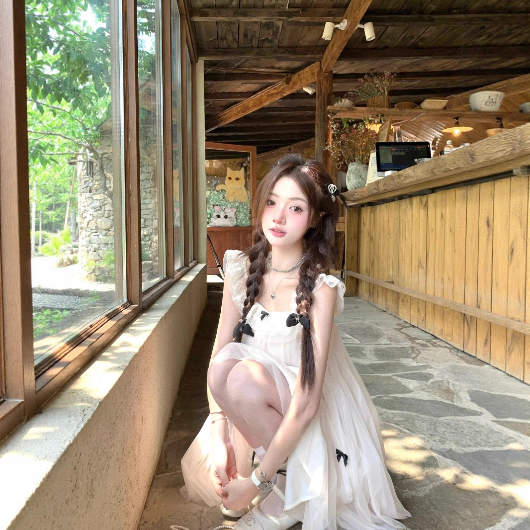 Women's French-style Sweet Bow-tied Puff-sleeve Dress