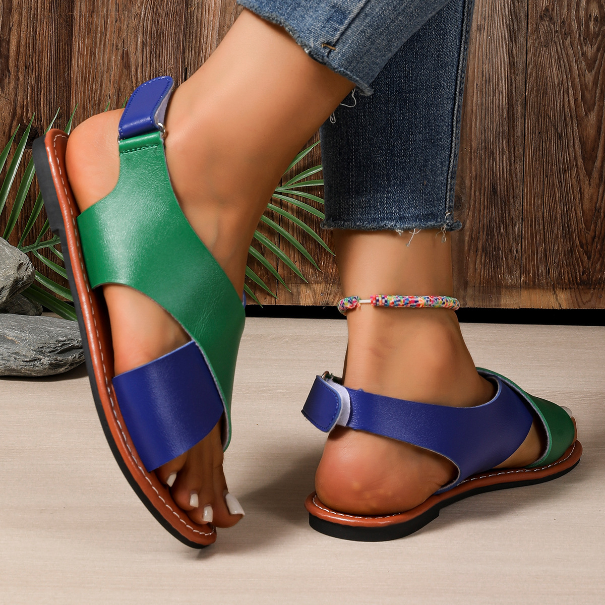 Women's color-block cross-strap flat sandals in Blue – Velcro closure flat sandal, side view showing cross-strap and color-block detail
