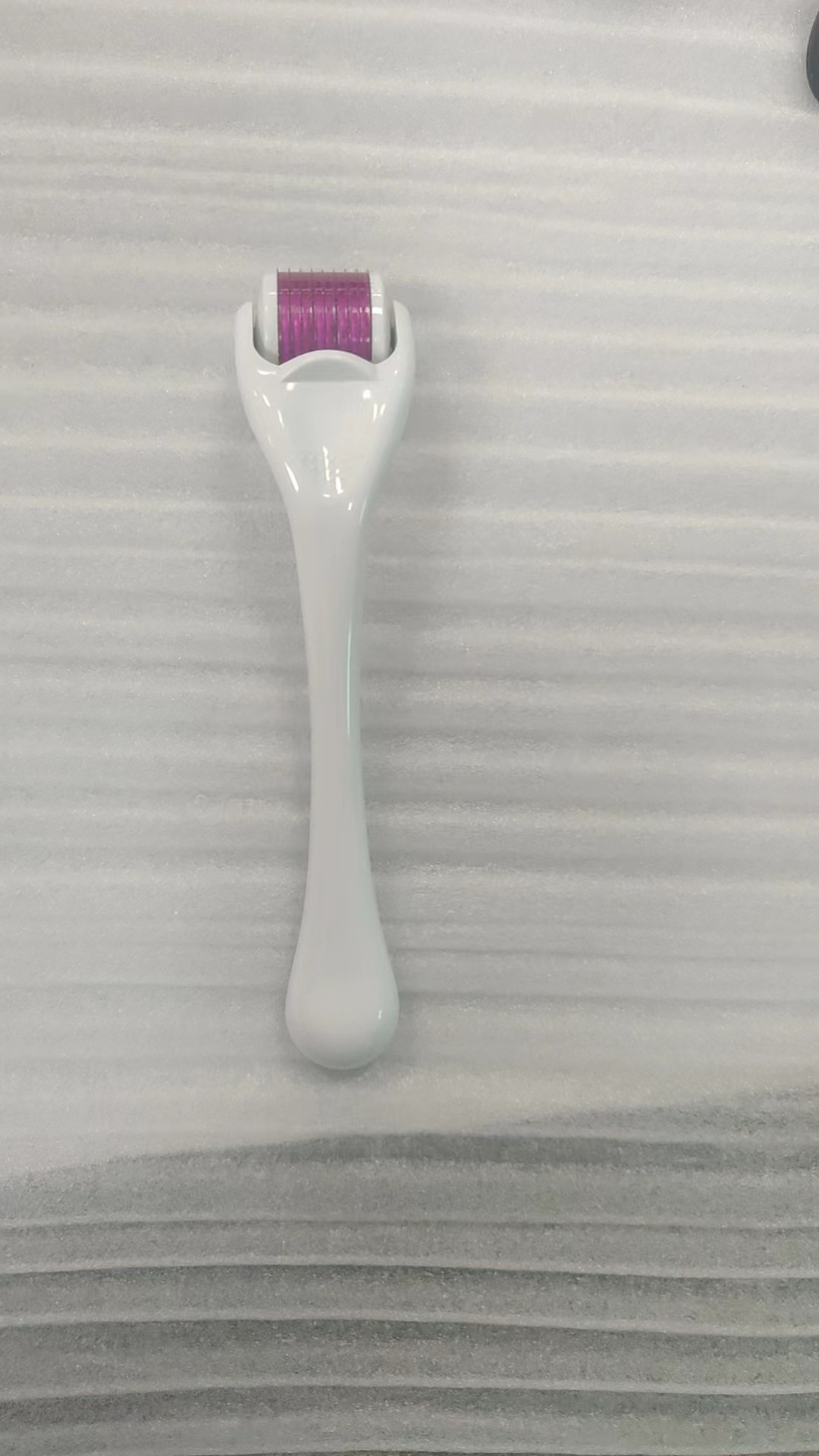 White Handle Purple Wheel