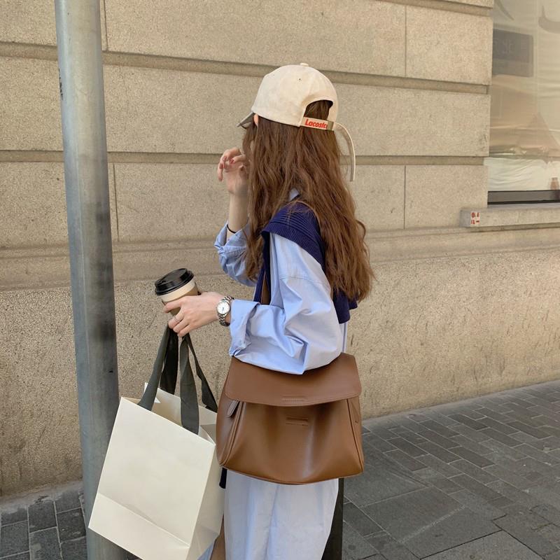 A Warm And Cozy Wool Shawl Or A Lightweight Cardigan That Can Be Layered