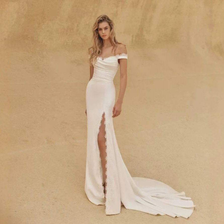 Off-the-shoulder Lightweight Wedding Dress With A Slit And A Trailing Train For The Brides Entrance