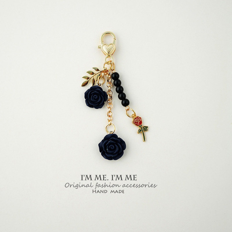 خاتم مفتاح سيارة بتصميم قفل باب كامليا أنيق