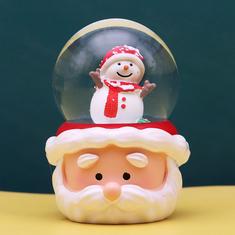 Cute cartoon santa claus trumpet snow globe ornament