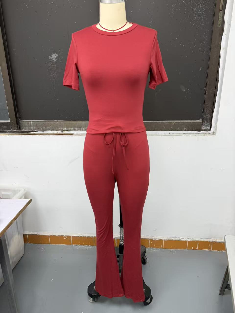 Black crew neck short sleeve top and full-length pants two-piece set – solid color casual women's style