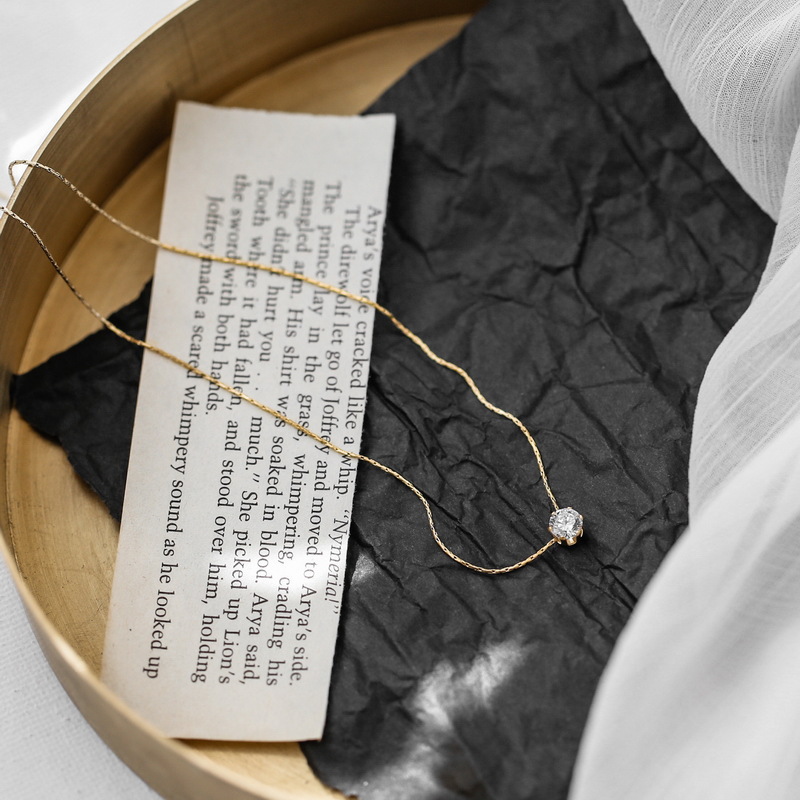 Geometric pendant necklace detail