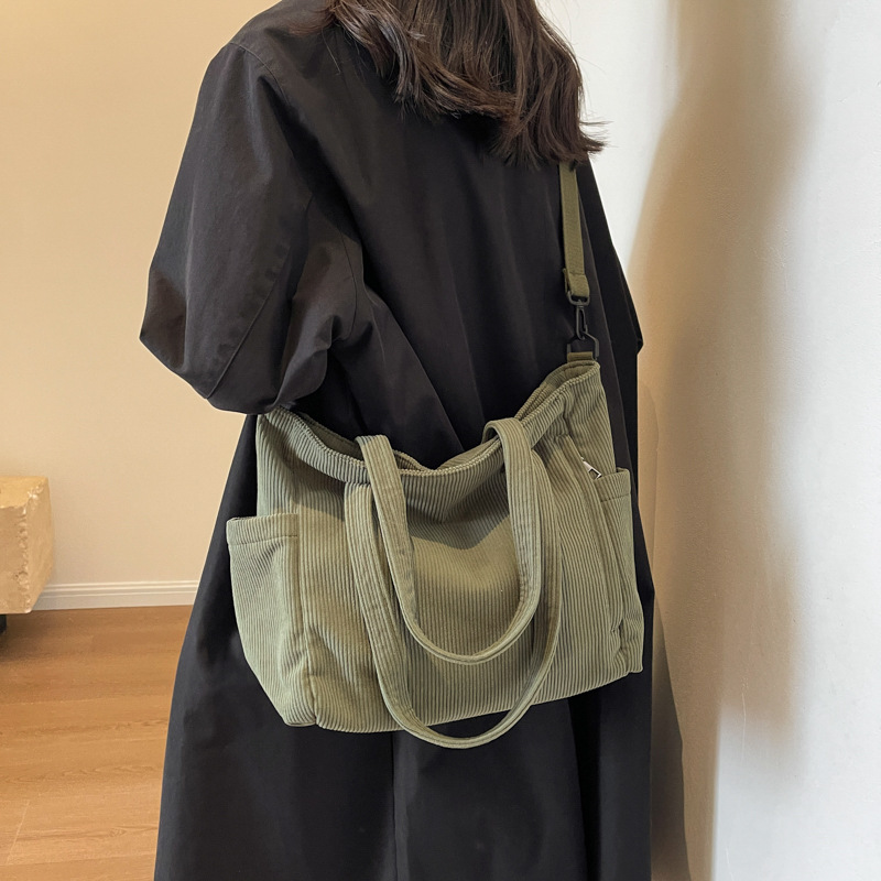 Large Capacity Art Student Shoulder Bag. Product information: Lining texture: Polyester, Applicable scenario: leisure travel, Color: creamy-white, green, black, Outer bag type: Sandwich pocket, Hardness: medium and soft, Material: corduroy, Suitcase shape