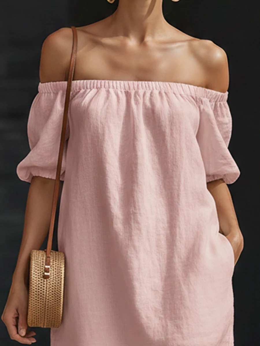 Women's off-shoulder mini dress in blue, full outfit view showing puff sleeves and loose fit