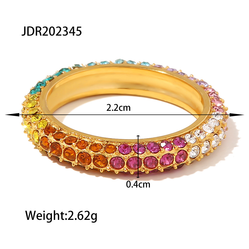 Title 9, Gold-plated stainless steel ring with inlaid co...