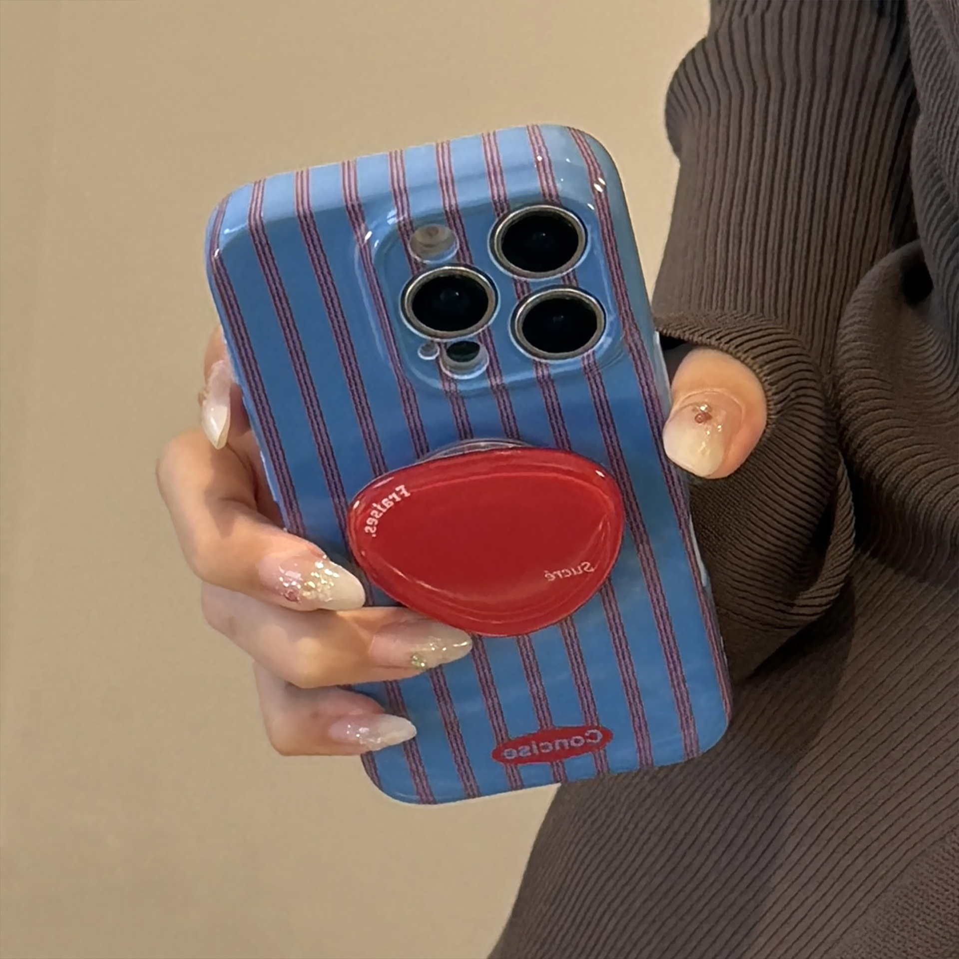 Red And Blue Striped Phone Case With A Retro Film-inspired Design And A Personalized Stand For Full-body Protection