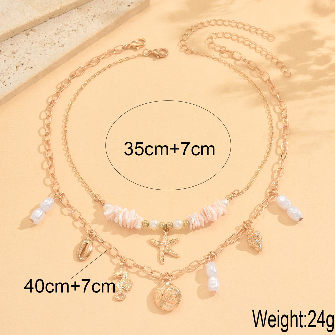 Ocean life pendant necklace lay flat